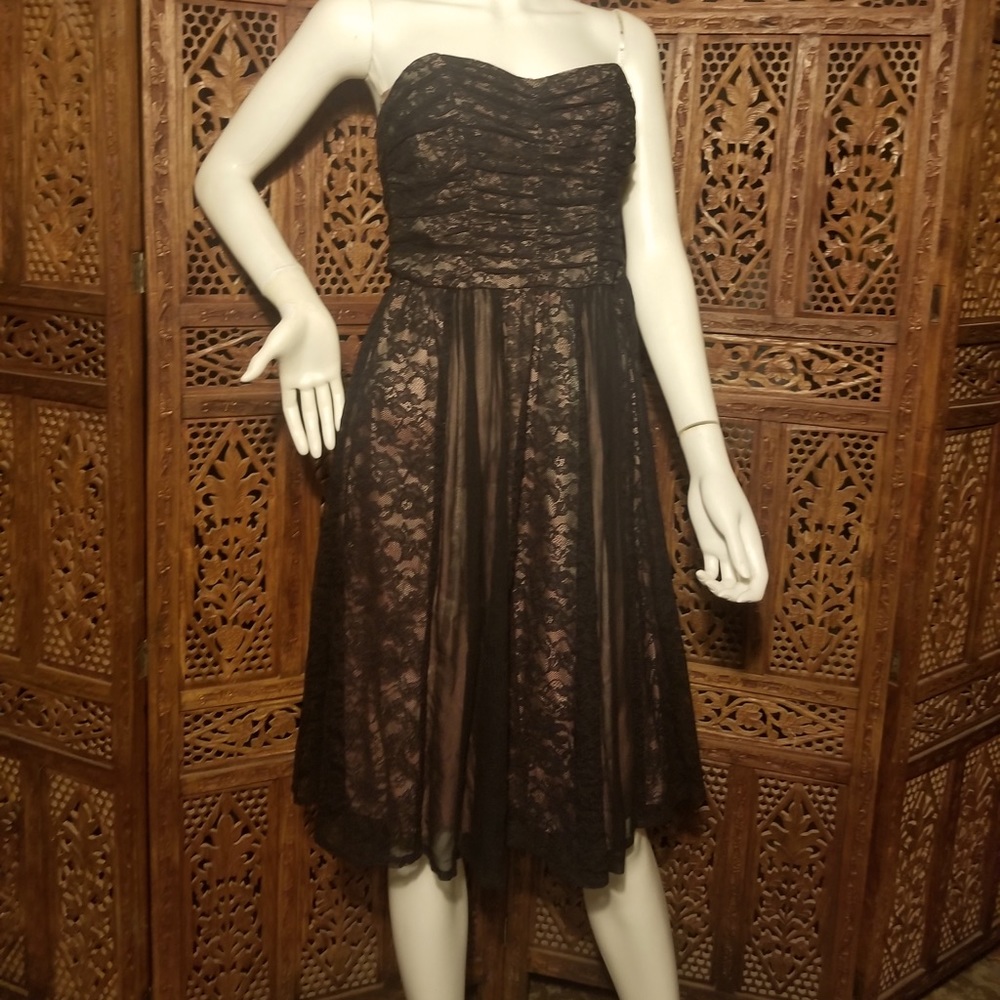 Black lacy strapless dress with metallic lining